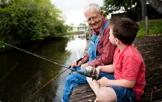 older kidney patient fishing with his grandson
