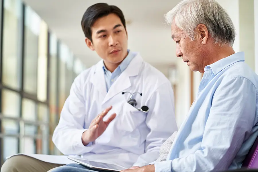 doctor telling patient they have kidney disease